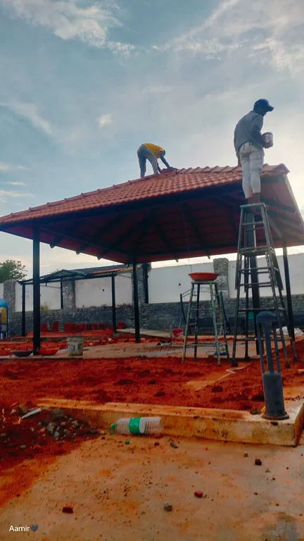 Mangalore tile pergola installation in progress on a fabricated steel frame by MD Fabrication