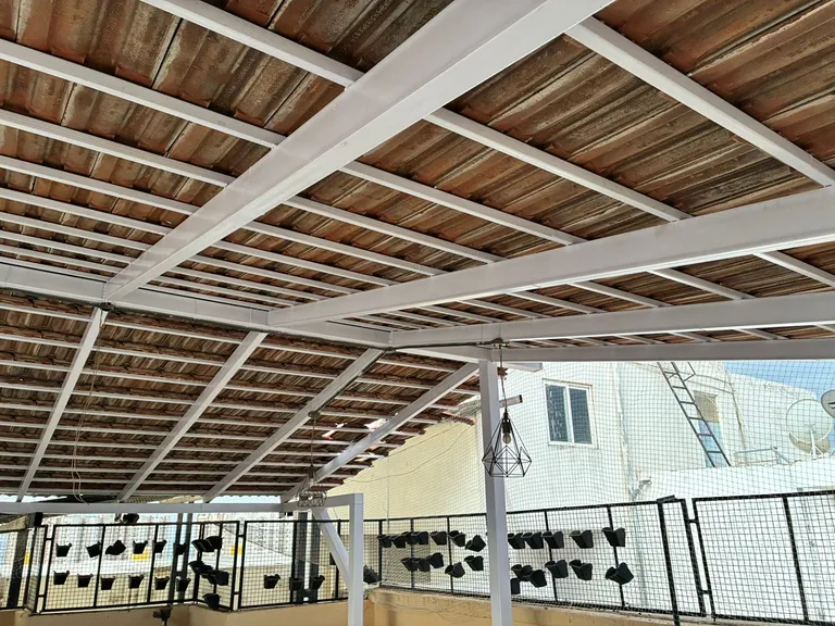 Mangalore tile terrace roofing underside with white fabricated steel frame