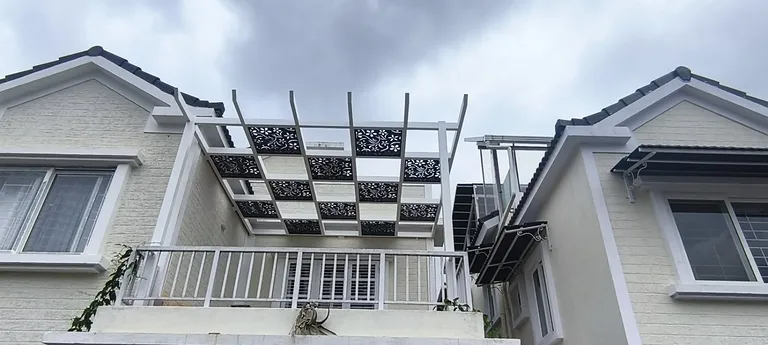 Residential balcony steel pergola frame fabricated between two house elevations